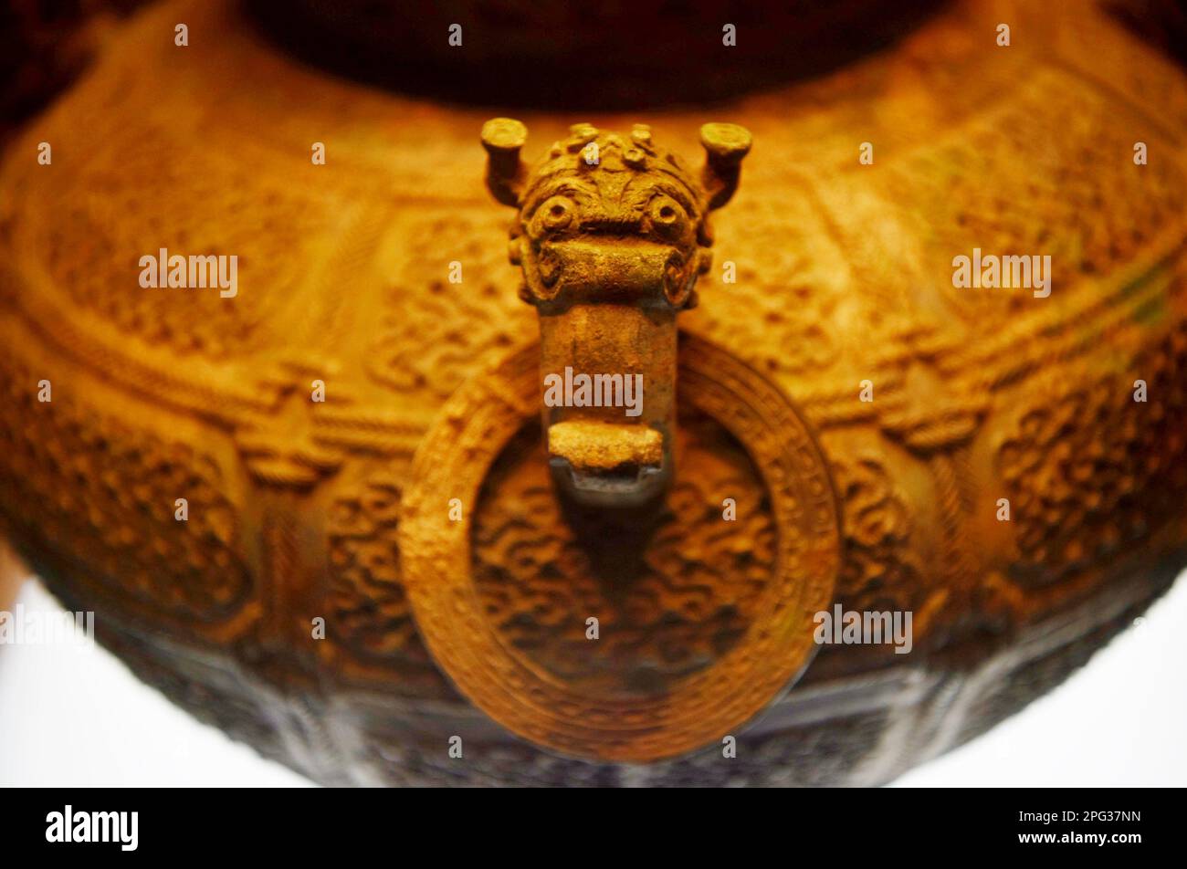 SHIJIAZHUANG, CHINA - MARCH 15, 2023 - The bronze vase of an adder in the Warring States Period on display at the Hebei Provincial Museum, 15 March 20 Stock Photo