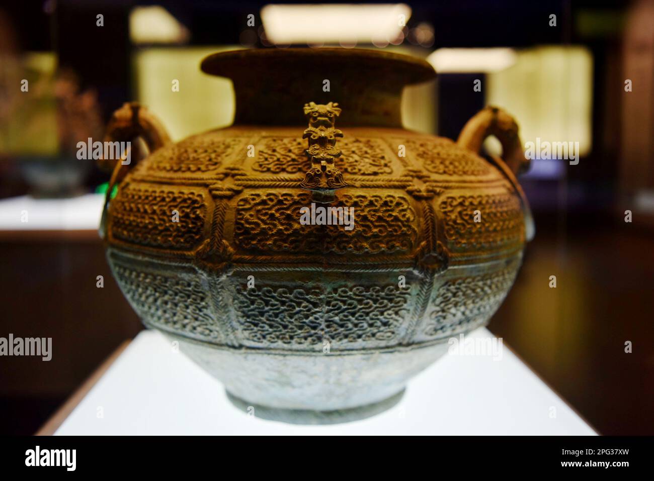 SHIJIAZHUANG, CHINA - MARCH 15, 2023 - The bronze vase of an adder in the Warring States Period on display at the Hebei Provincial Museum, 15 March 20 Stock Photo
