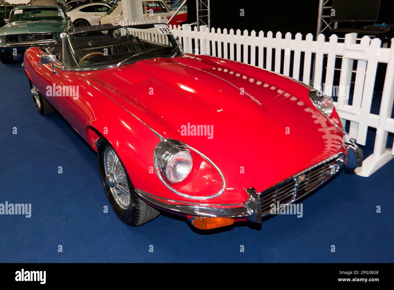 ThreeQuarters Front View of a Red, 1974, Jaguar EType Series III