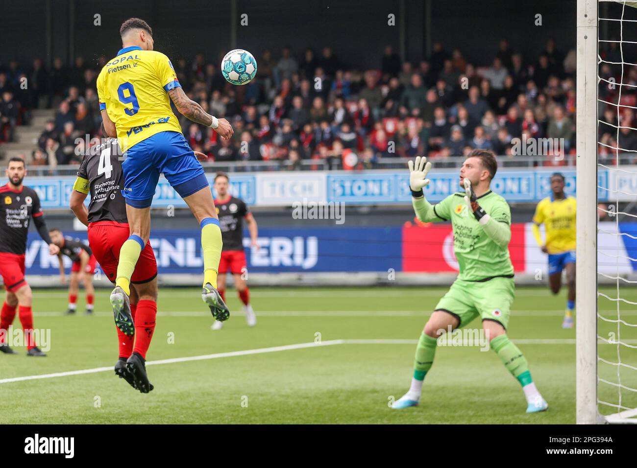 ROTTERDAM, NETHERLANDS - MARCH 19: Bjorn Johnsen of SC Cambuur, goalkeeper Stijn van Gassel of Excelsior Rotterdam during the Dutch Eredivisie match b Stock Photo