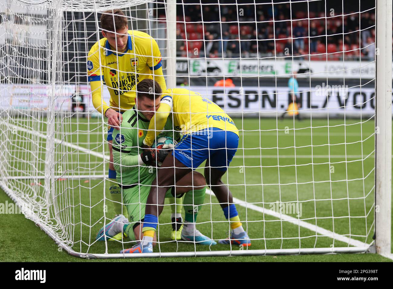 ROTTERDAM, NETHERLANDS - MARCH 19: Roberts Uldrikis of SC Cambuur, goalkeeper Stijn van Gassel of Excelsior Rotterdam, Alex Bangura of SC Cambuur duri Stock Photo