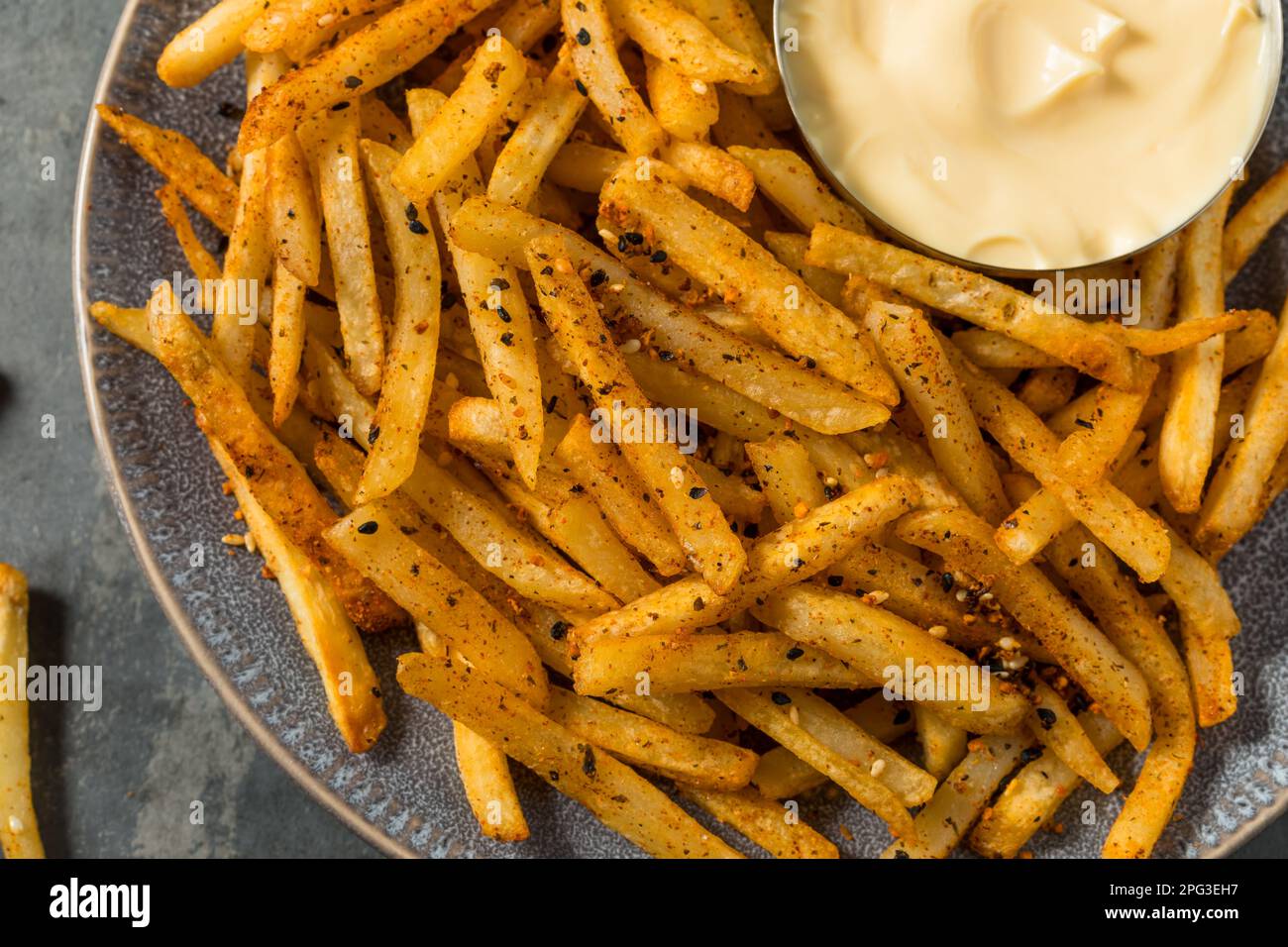 Spicy Japanese Togarashi Shichimi French Fries with Mayo Stock Photo