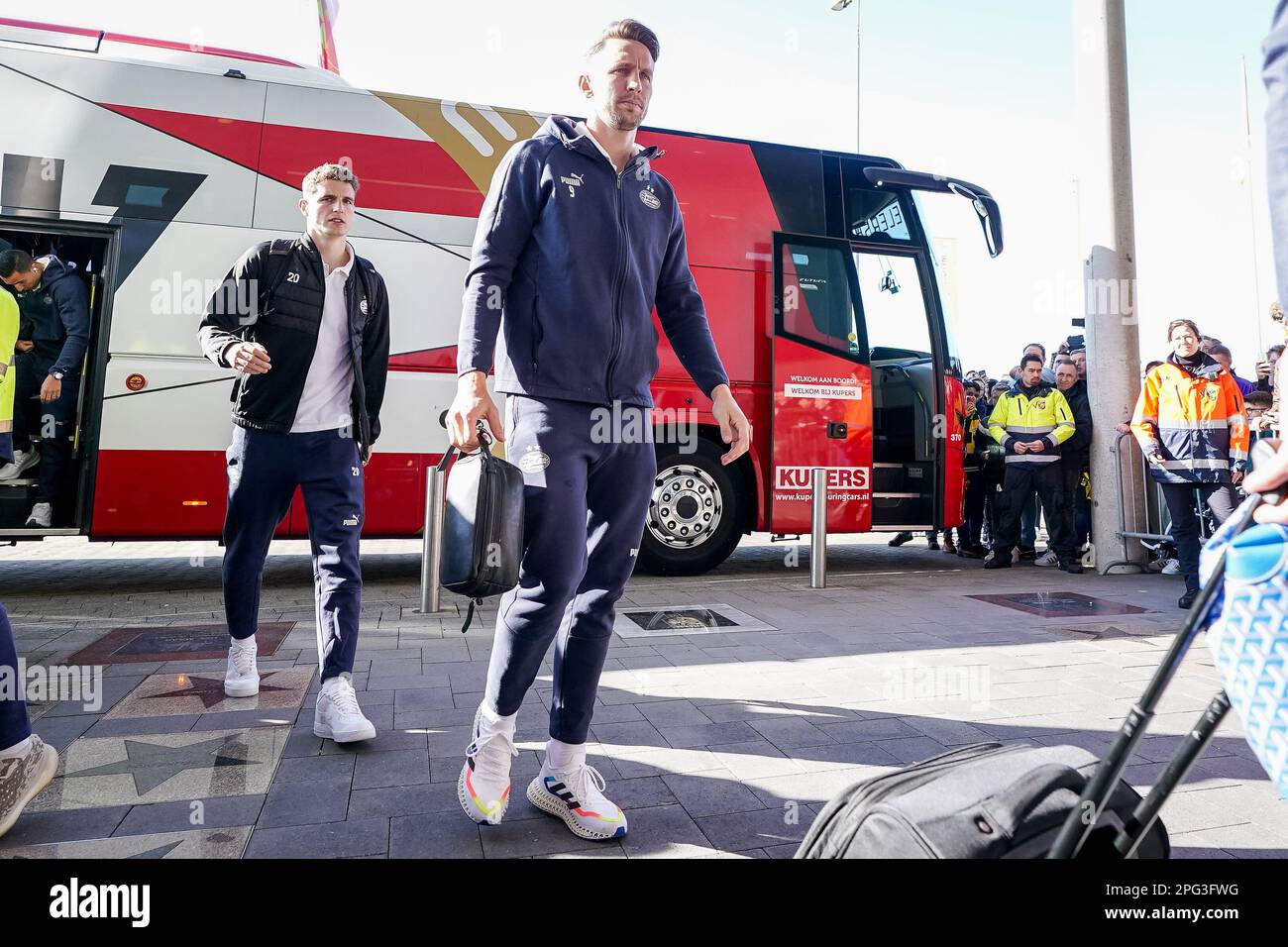 ARNHEM, NETHERLANDS - MARCH 19: Guus Til of PSV and Luuk de Jong of PSV arrive prior to the Eredivisie match between Vitesse and PSV at the GelreDome Stock Photo