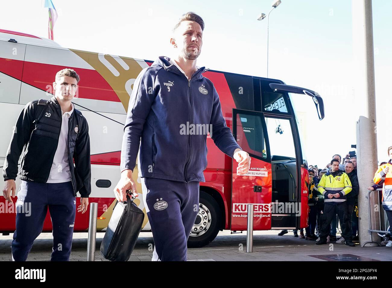 ARNHEM, NETHERLANDS - MARCH 19: Guus Til of PSV and Luuk de Jong of PSV arrive prior to the Eredivisie match between Vitesse and PSV at the GelreDome Stock Photo