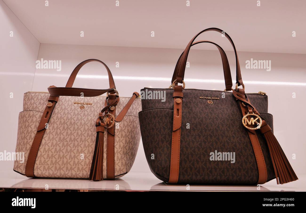 MICHAEL KORS BAGS FOR WOMEN INSIDE THE FASHION STORE Stock Photo