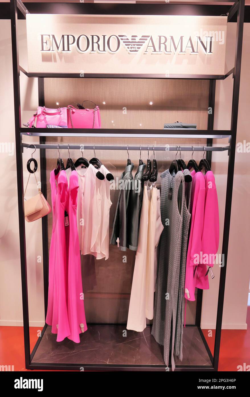 EMPORIO ARMANI CLOTHING FOR WOMAN INSIDE THE FASHION STORE Stock Photo