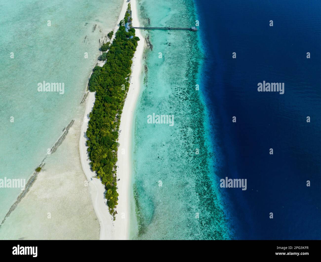 Top view of atoll and tropical island Mataking with beach. Tun Sakaran Marine Park. Borneo, Sabah, Malaysia. Stock Photo