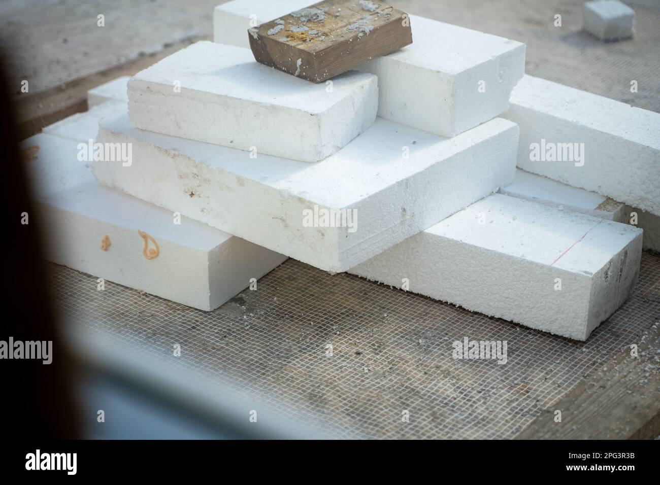 White sheets of Styrofoam in different sizes closeup. Universal