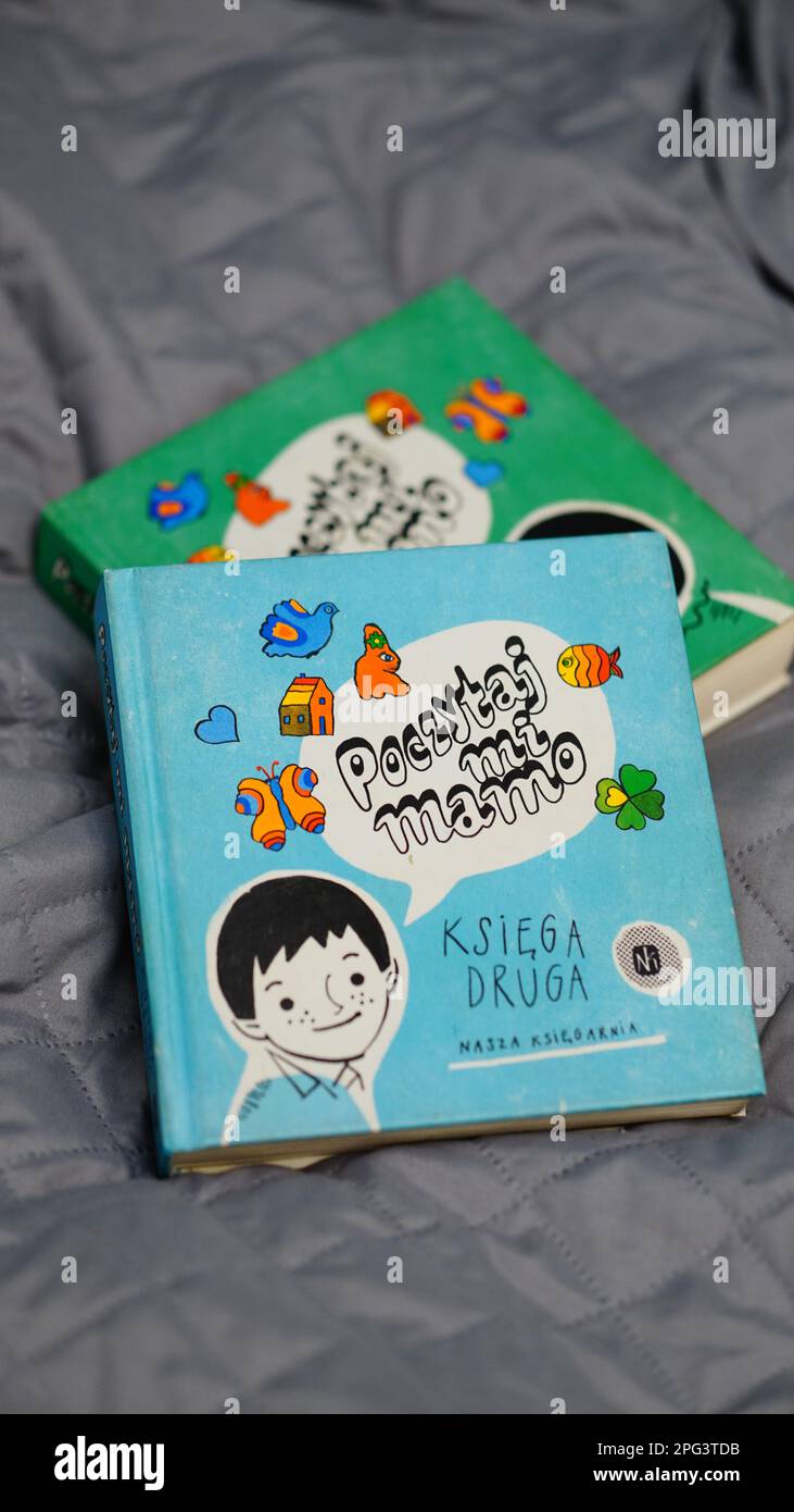 Kids books read to me mom in polish green and blue covers lying on
