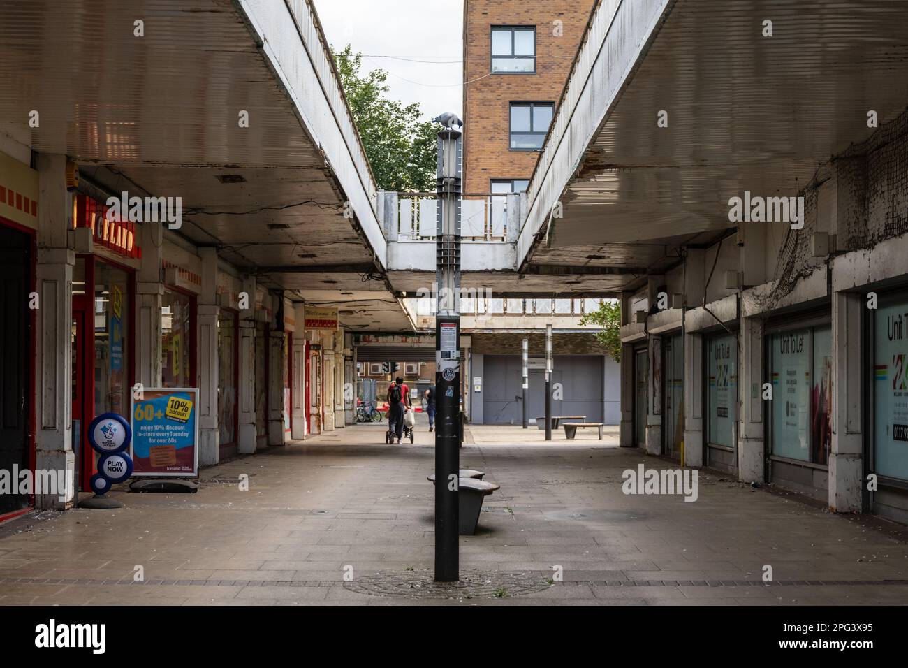 A discount supermarket holds on as one of the last shops in the decaying St Catherine's Place shopping precinct in south Bristol. Stock Photo