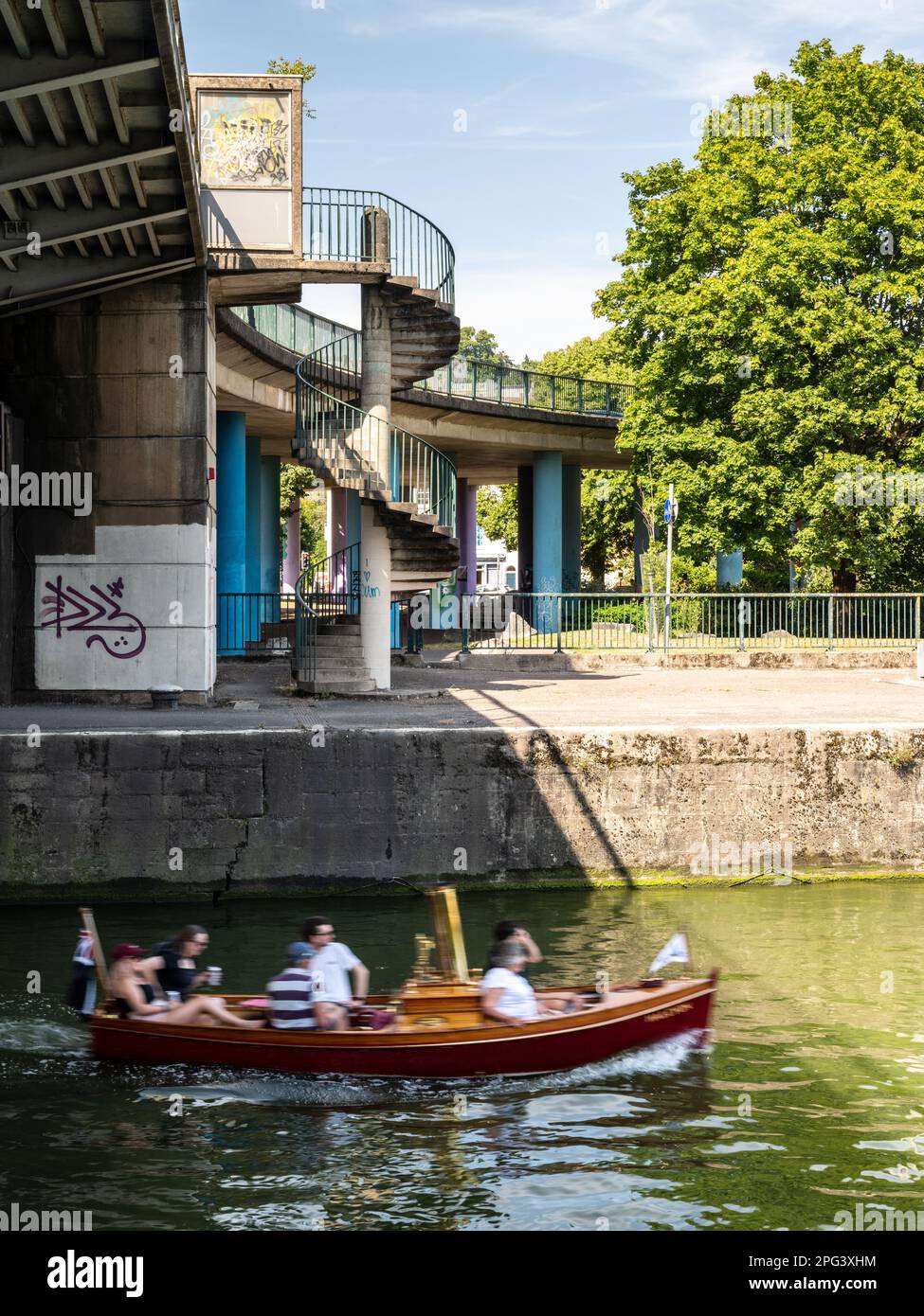 A small steam boat passes under Plimsoll Bridge on Bristol's Floating Harbour. Stock Photo