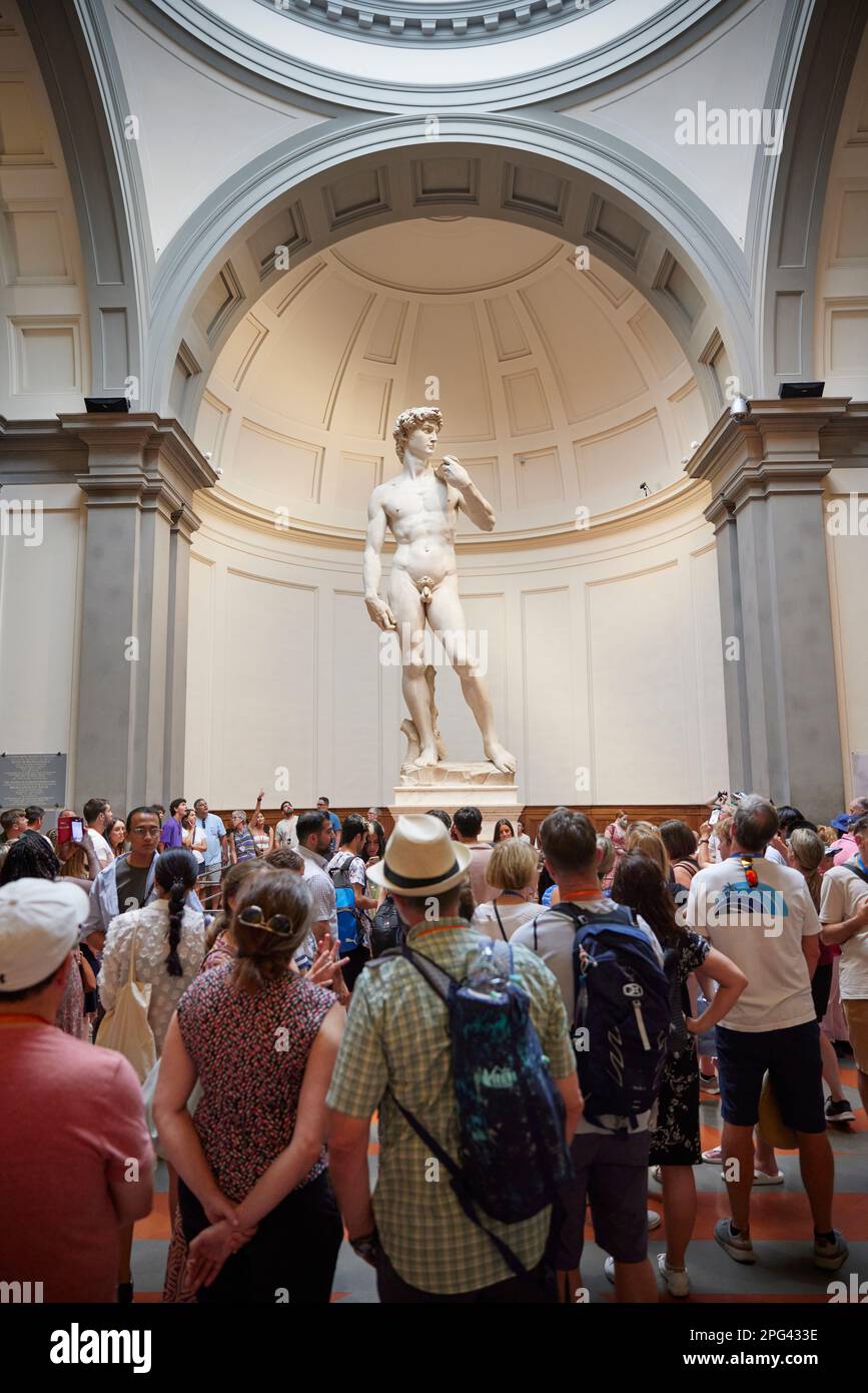 People looking at the statue of David, Galleria dell'Accademia, Florence, Italy Stock Photo