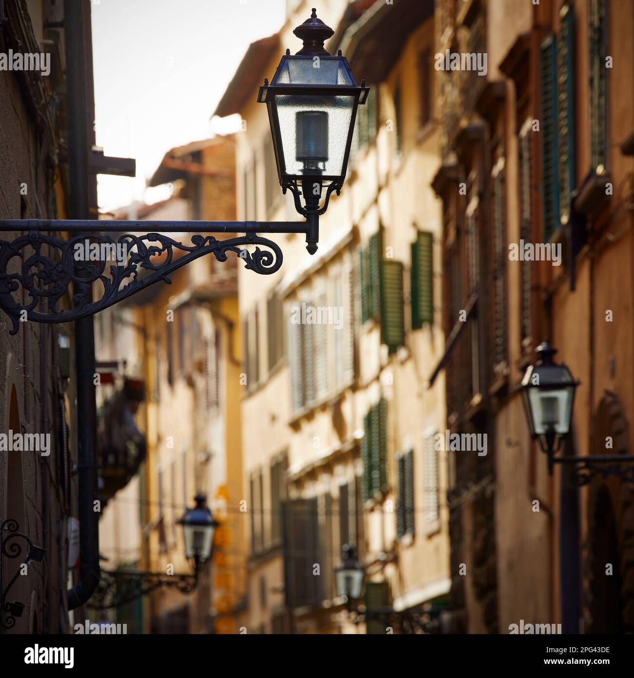 Streetlights on typical street, Florence, Italy Stock Photo