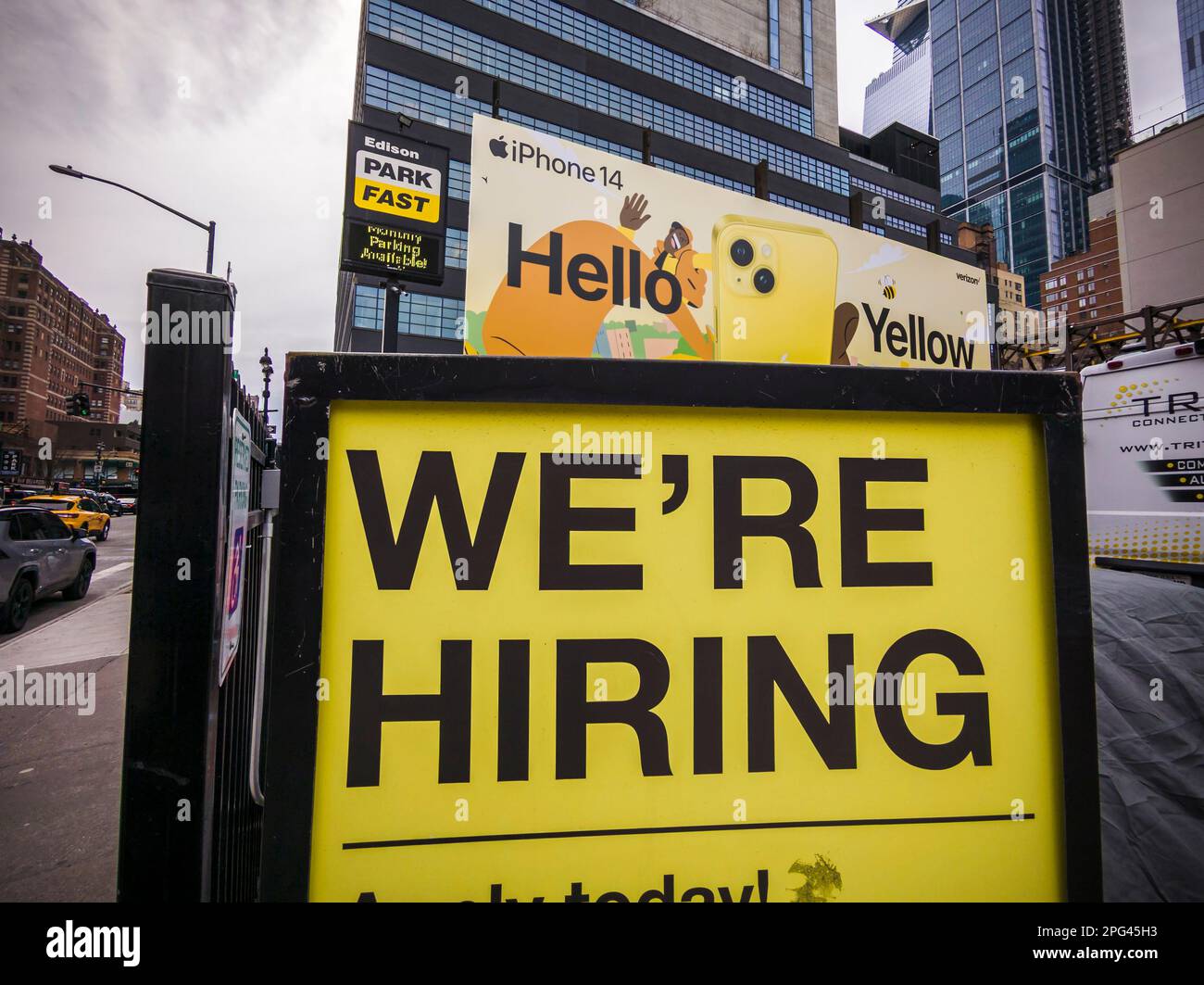 Hiring sign outside an Edison Park Fast parking lot in the Hell’s Kitchen neighborhood in New York on Friday, March 17, 2023. (© Richard B. Levine) Stock Photo