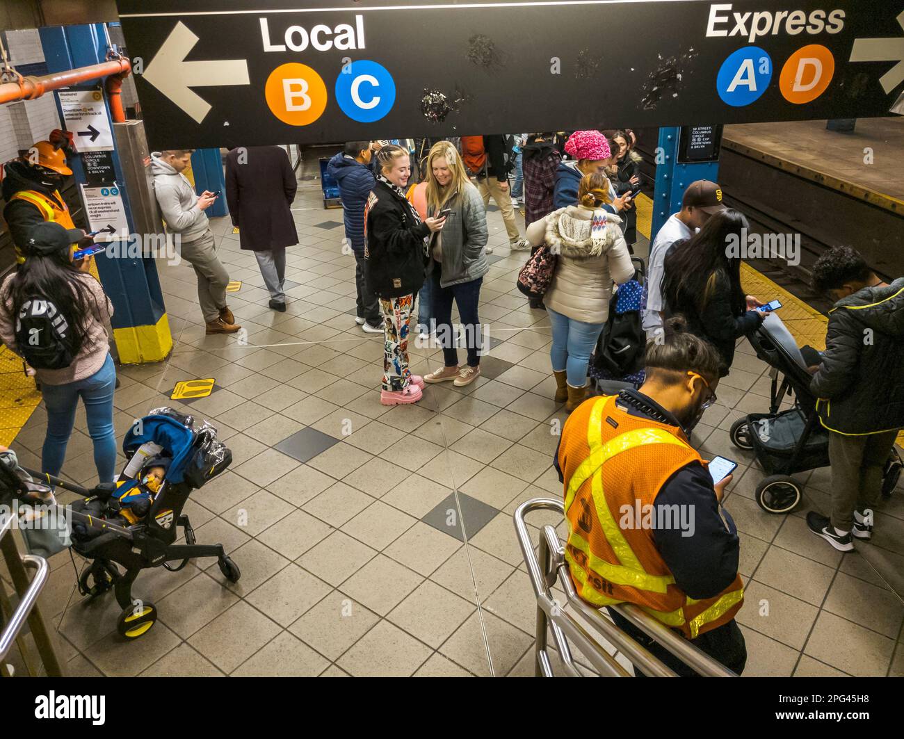 Weekend ridership at the 59th Street-Columbus Circle station in the New York subway on Saturday, March 18, 2023. (© Richard B. Levine) Stock Photo