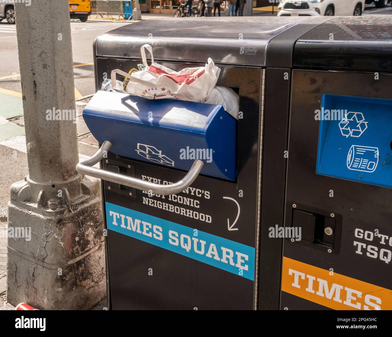 Overflowing street trash receptacle in Times Square in New York on Saturday, March 18, 2023.  (© Richard B. Levine) Stock Photo