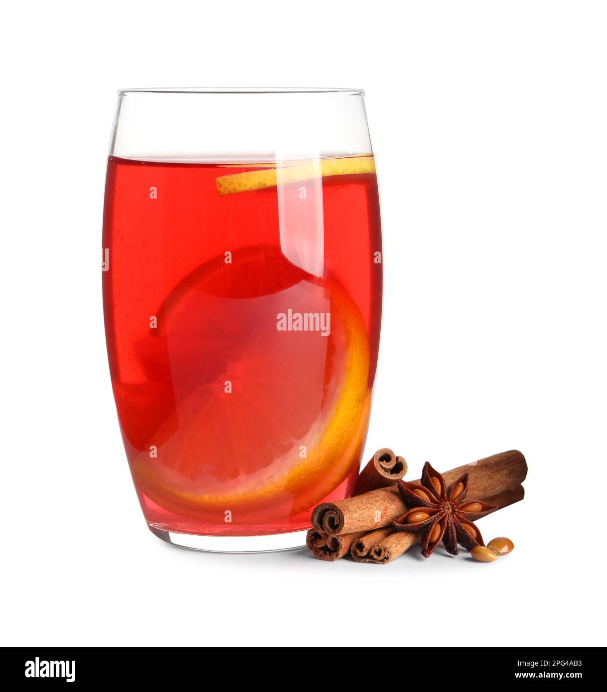 Glass of aromatic punch drink and ingredients on white background Stock