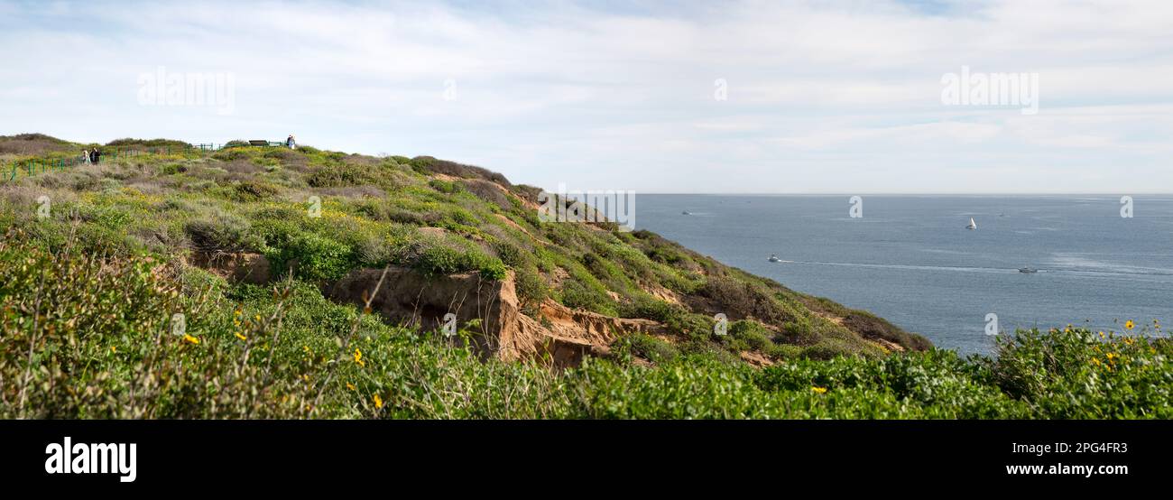 Dana Point Headlands Conservation Area landscape and with sailboats and yachts in in the Pacific Ocean in southern California Stock Photo