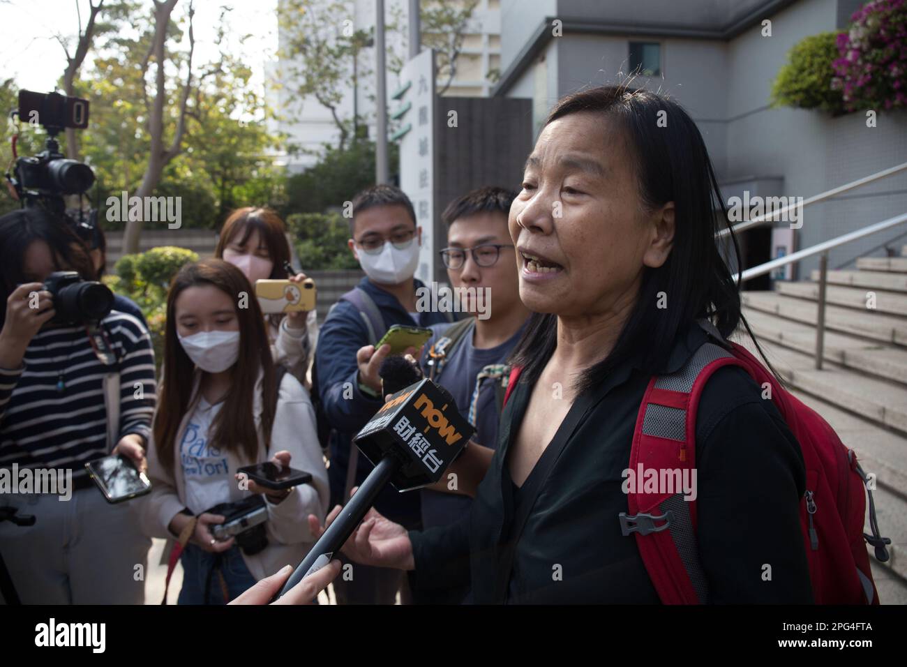 League of Social Democrats chairwoman Chan Po-ying addresses the media outside Kowloon City Court after her conviction of collecting donations without a permit under the Summary Offences Ordinance at Kowloon City Court. Chan and Christina Tang Yuen-ching, a former assistant to ex-lawmaker "Long Hair" Leung Kwok-hung, had set up a street booth on a footbridge on Sai Yee Street to rally public support and urge authorities to "release political prisoners" in Mong Kok on July 24, 2021.  16MAR23 SCMP/ Brian Wong Stock Photo
