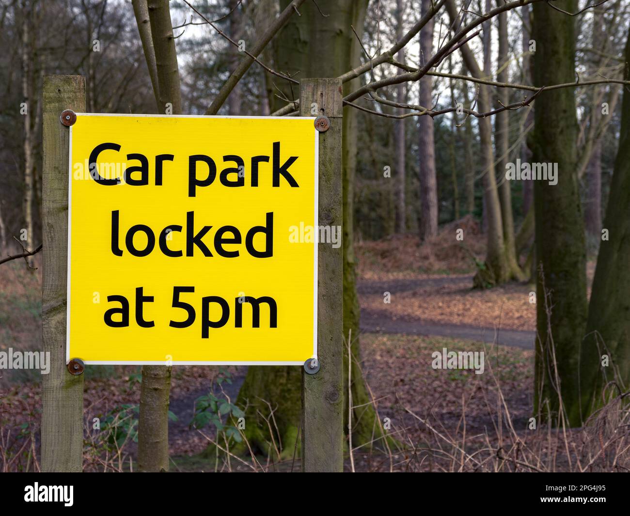 car park locked at 5 pm sign yellow color Delamere forest car park