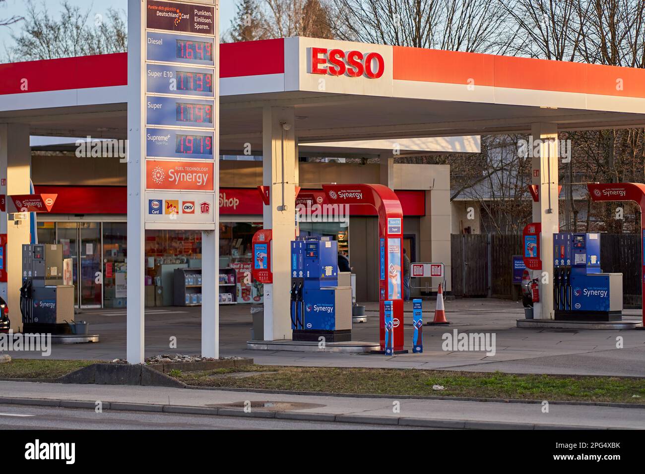 Nürtingen, Germany - February 19, 2022: Price display in front of a Esso gas station at dawn. High and expensive fuel prices in europe. Stock Photo