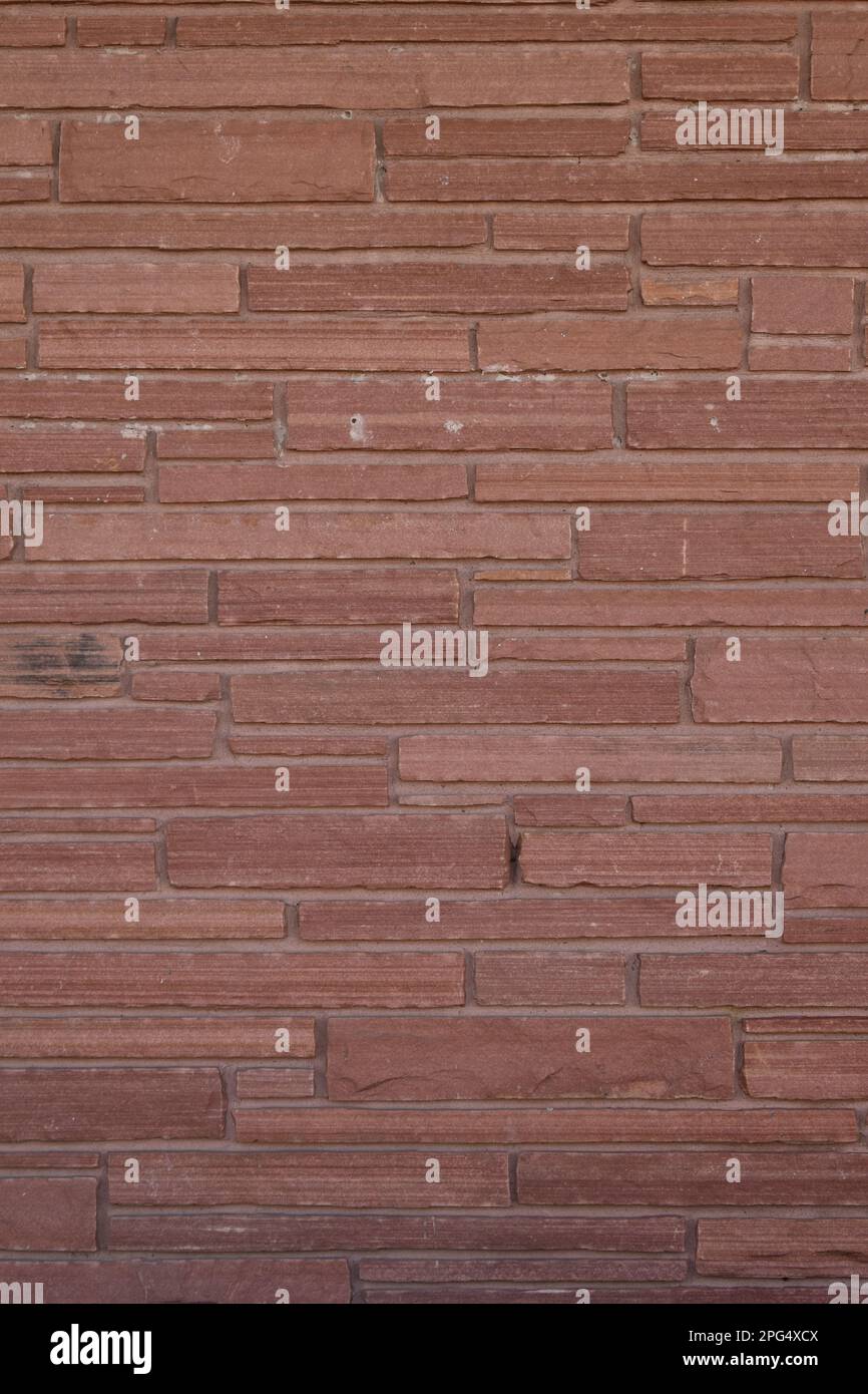 Thin red stone brick background Stock Photo - Alamy