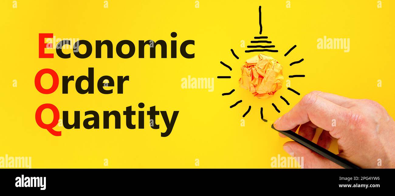 EOQ economic order quantity symbol. Concept words EOQ economic order quantity on paper on beautiful yellow background. Orange light bulb icon. Busines Stock Photo