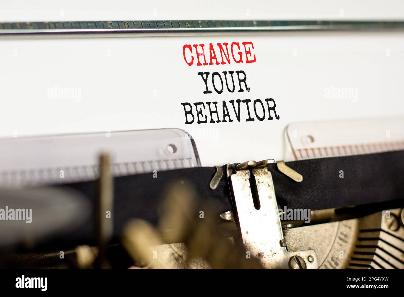 Behavior Typewriter Motivation Change your behavior symbol. Concept words Change your ...