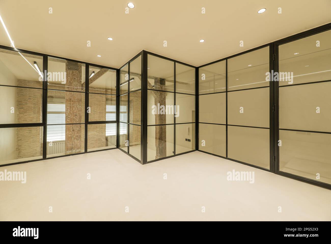 Loft apartment with vintage wooden beams and pillars, exposed brick