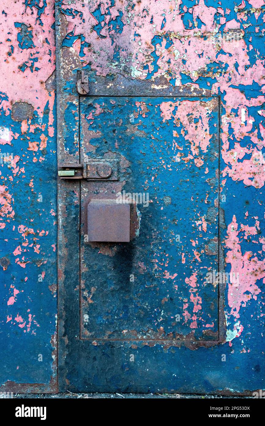 Peeling paint surface to warehouse steel door Stock Photo Alamy