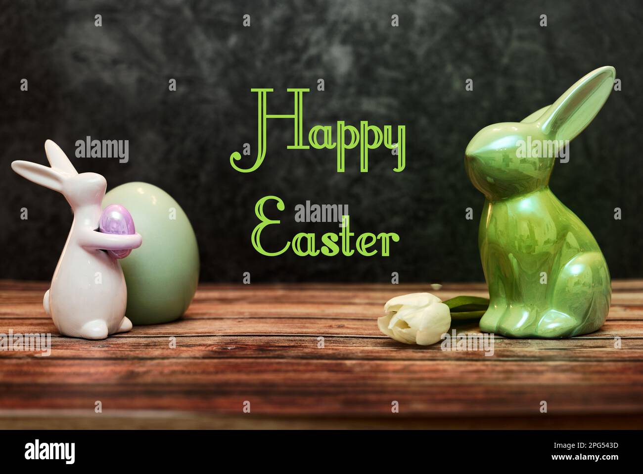 Happy Easter. Congratulatory easter background. Easter bunnys egg and flower Stock Photo