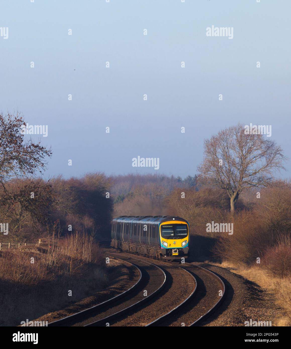 First Transpennine Express Siemens class 85 train passing the Yorkshire countryside at Picton, County Durham Stock Photo