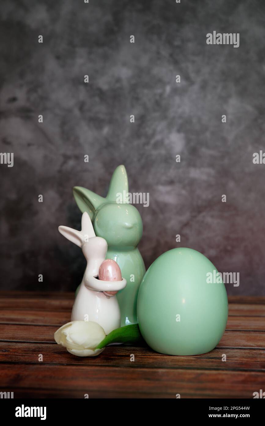 Happy Easter. Congratulatory easter background. Easter bunnys egg and flower Stock Photo