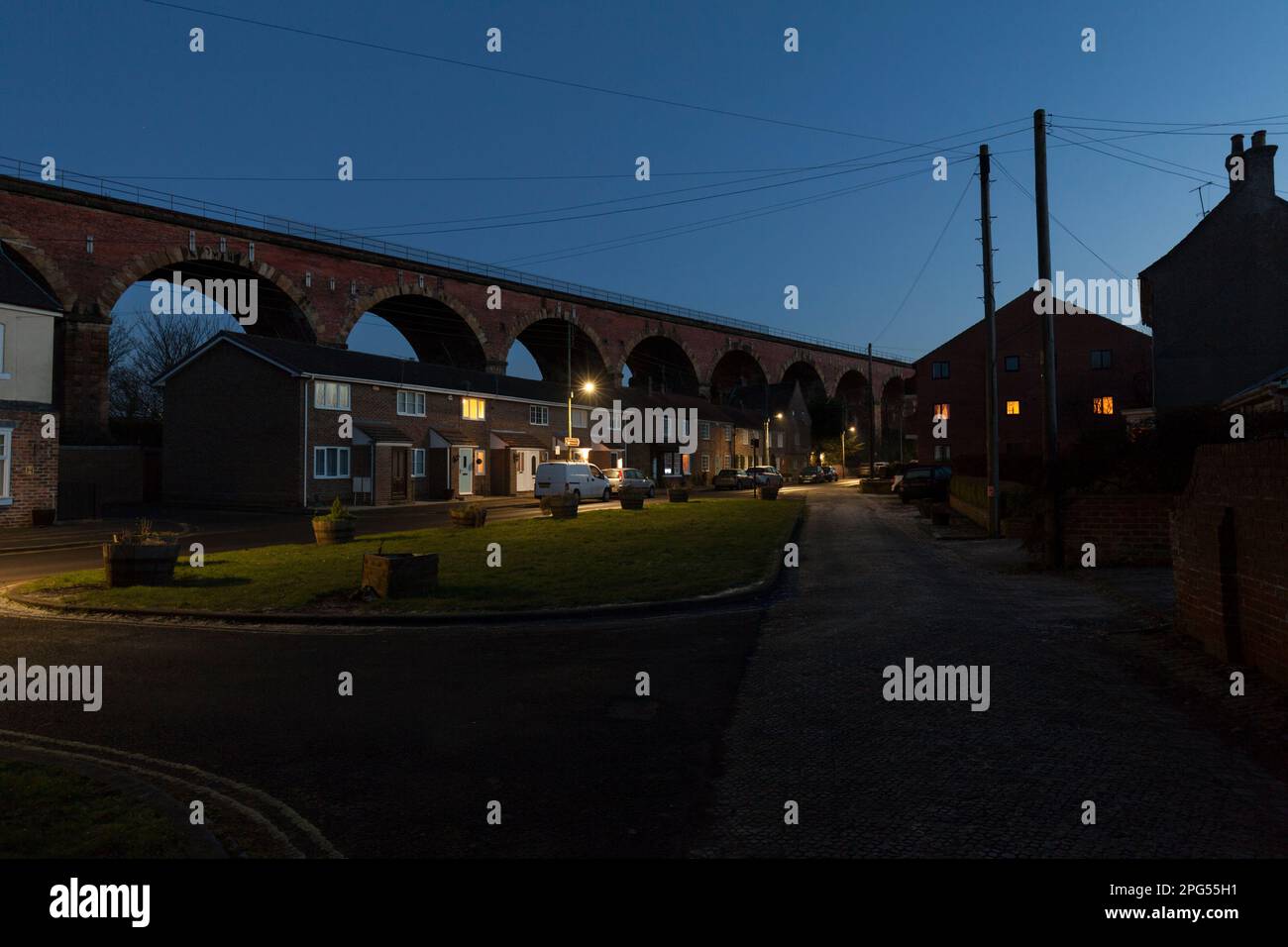 Terraced houses under the viaduct at Yarm, County Durham, UK Stock Photo