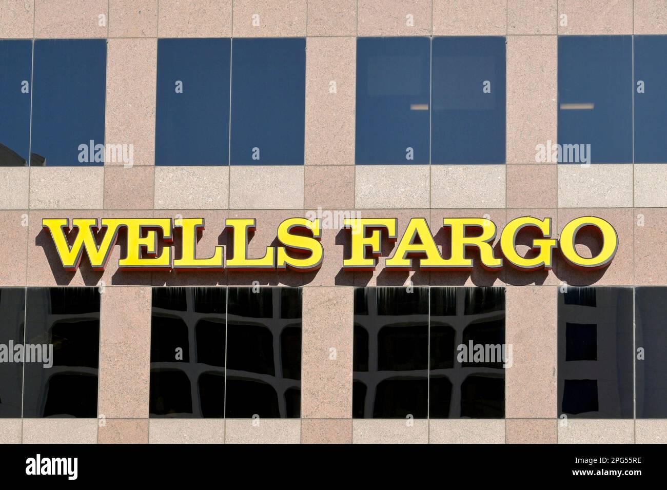 Austin, Texas, USA - February 2023: Sign on the outside of the offices of the Wells Fargo bank in the city centre Stock Photo