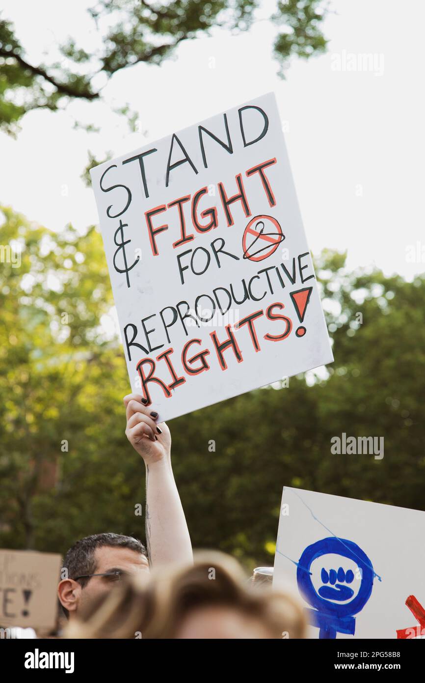 'Stand & Fight for Reproductive Rights!' Sign at Abortion Rights Rally, Washington Square, New York City, New York, USA Stock Photo