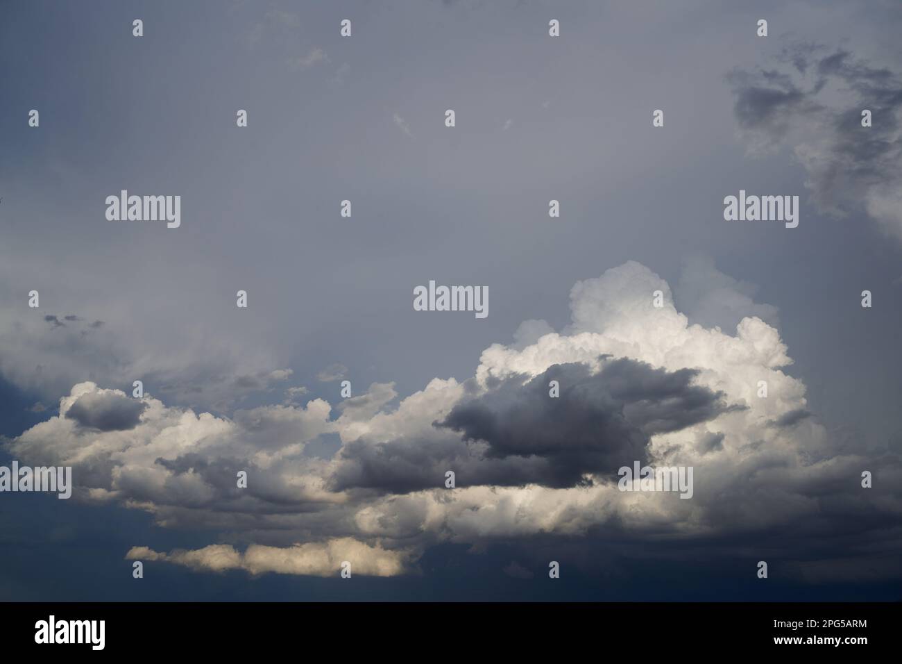 Late afternoon thunderstorm developing approximately 50 kilometres from camera positioin. Isolated heavy rainfall resulted from this storm. Stock Photo