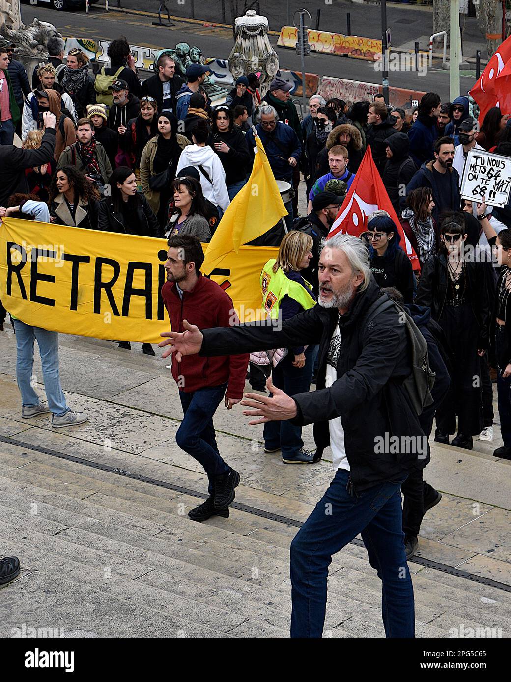 Marseille, France. 18th Mar, 2023. A protester chants slogans during the demonstration. People took part in a demonstration, unauthorized by the prefecture, to protest against the pension reform wanted by the French government which would raise the retirement age from 62 to 64. (Photo by Gerard Bottino/SOPA Images/Sipa USA) Credit: Sipa USA/Alamy Live News Stock Photo