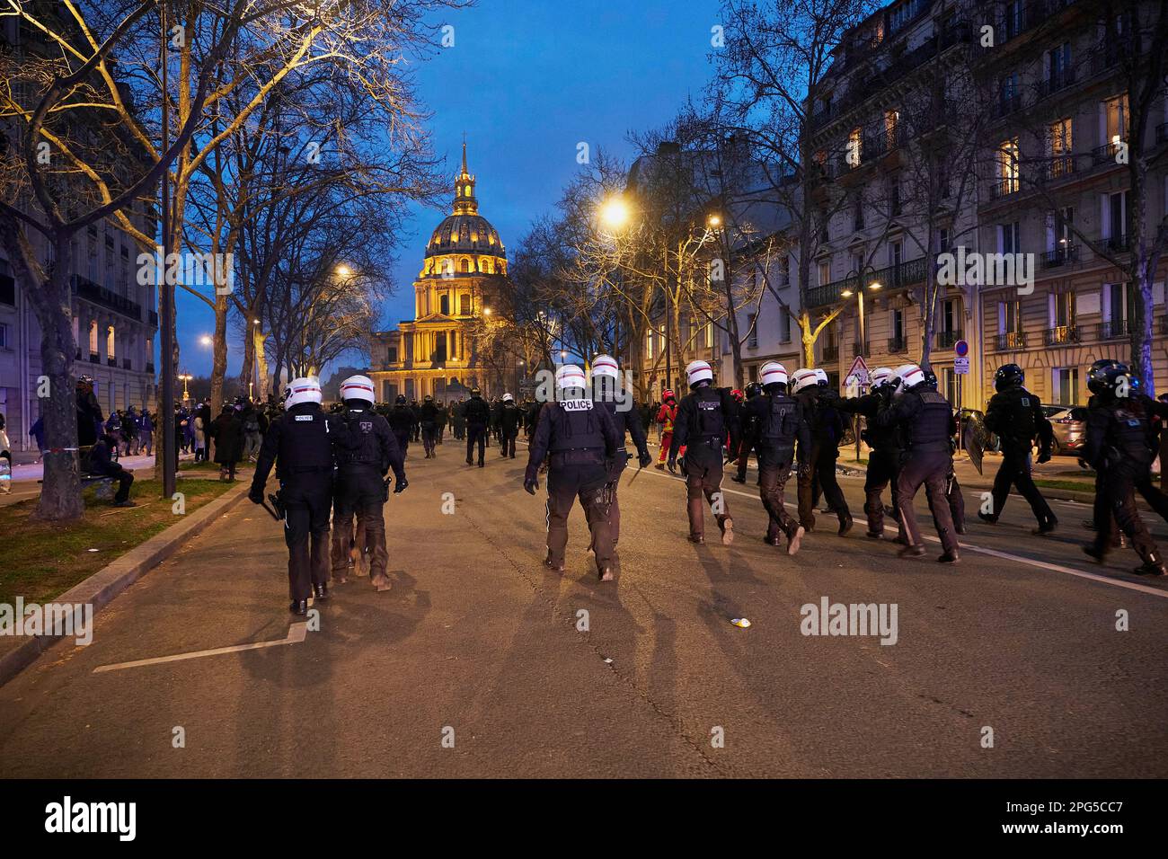 Paris, Ile de France, FRANCE. 20th Mar, 2023. Riot police charge after violence during protests in Paris after a vote of no confidence was rejected by a meagre 9 votes. The no confidence vote could have toppled Emmanuel Macron government and would have nullified the pension reform law that he pushed without a majority vote through the parliament. (Credit Image: © Remon Haazen/ZUMA Press Wire) EDITORIAL USAGE ONLY! Not for Commercial USAGE! Stock Photo