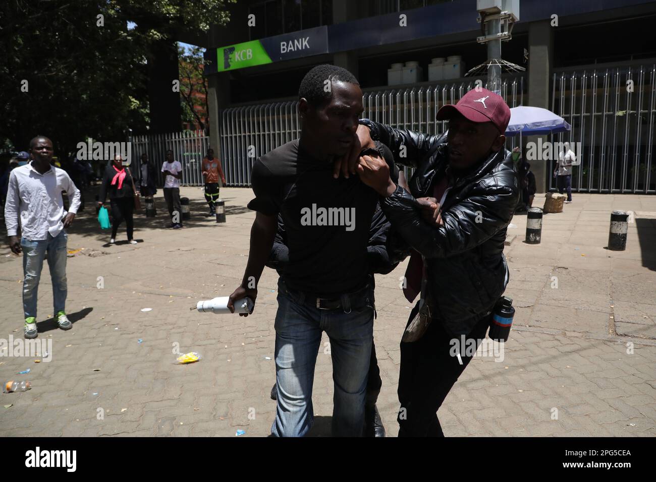 Nairobi, Kenya. 20th Mar, 2023. A plain clothes police officer arrests a  protester during a demonstration against the cost of living and President  William Ruto's administration. (Photo by John Ochieng/SOPA Images/Sipa USA)