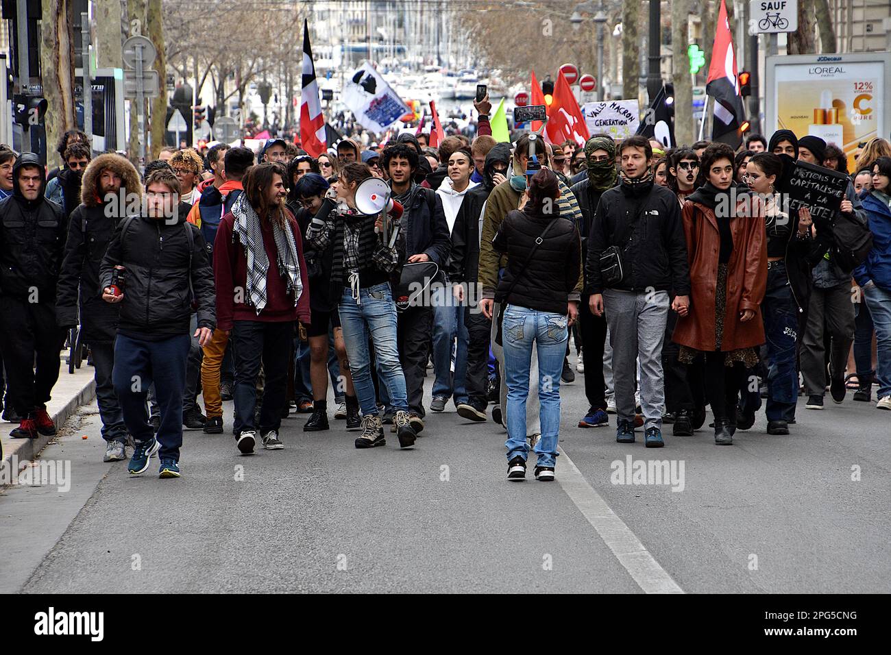 Marseille, France. 18th Mar, 2023. Protesters march through the streets of Marseille during the demonstration. People took part in a demonstration, unauthorized by the prefecture, to protest against the pension reform wanted by the French government which would raise the retirement age from 62 to 64. (Photo by Gerard Bottino/SOPA Images/Sipa USA) Credit: Sipa USA/Alamy Live News Stock Photo