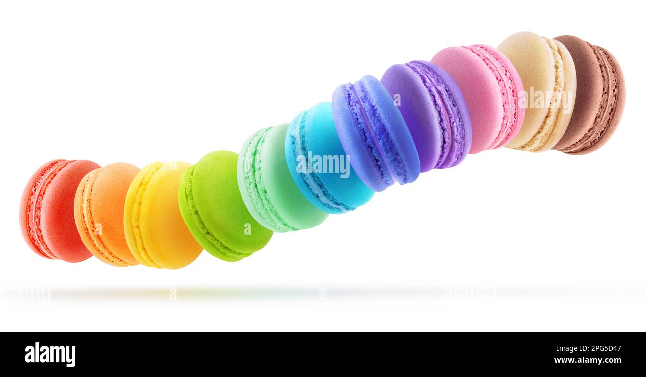 Macaroons of various flavours in long line over white background, levitation panorama Stock Photo