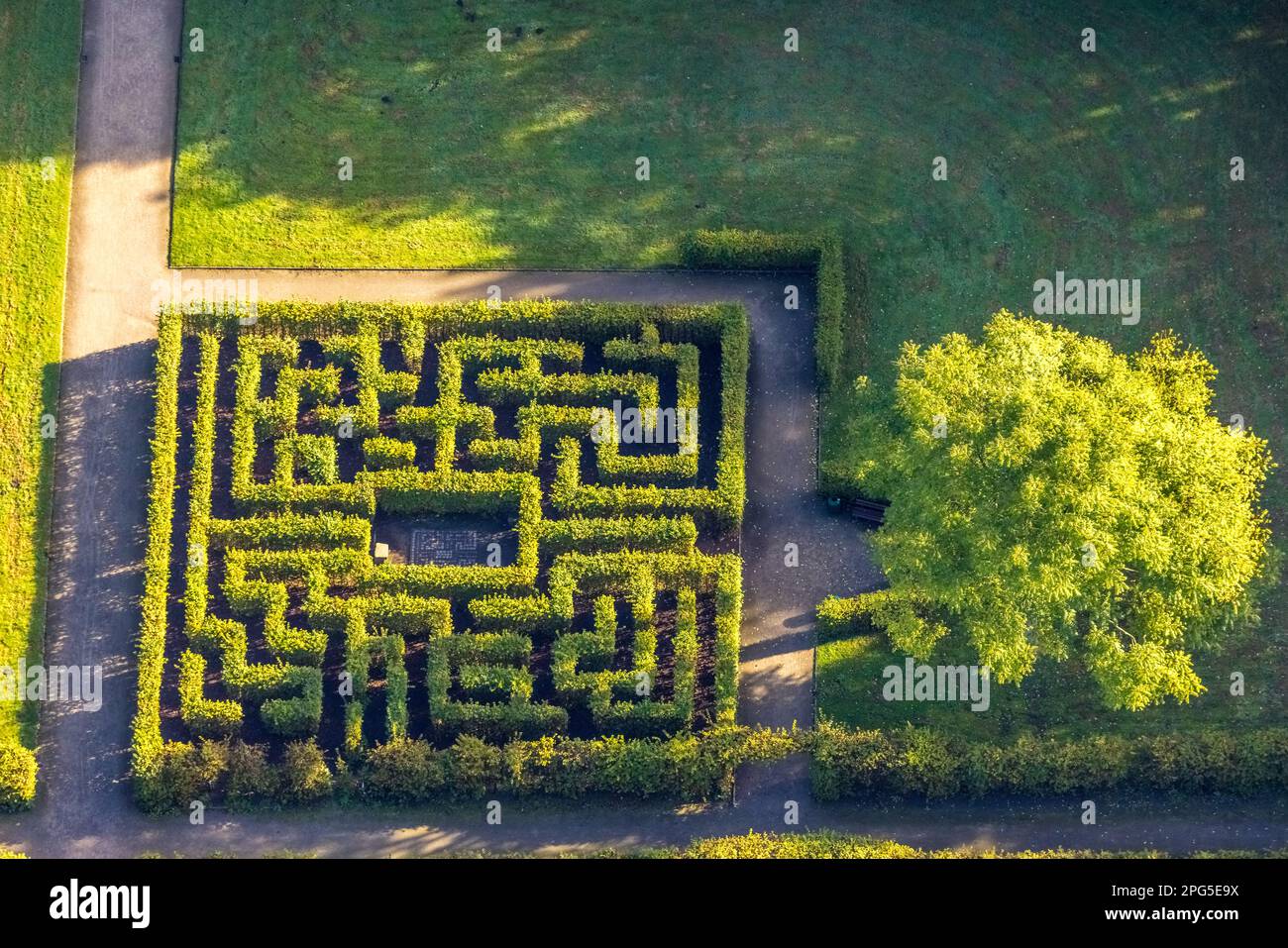 Aerial view, moated castle castle mountains labyrinth greenery in Buer