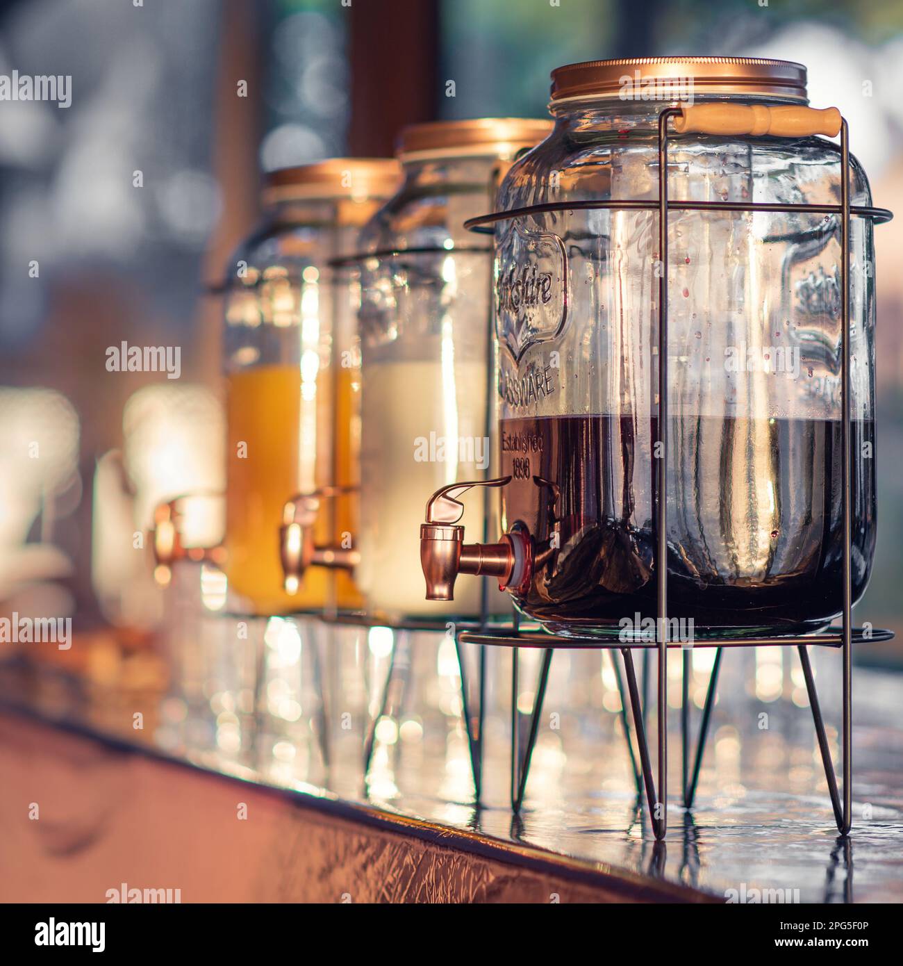 juices containers at buffet Stock Photo Alamy