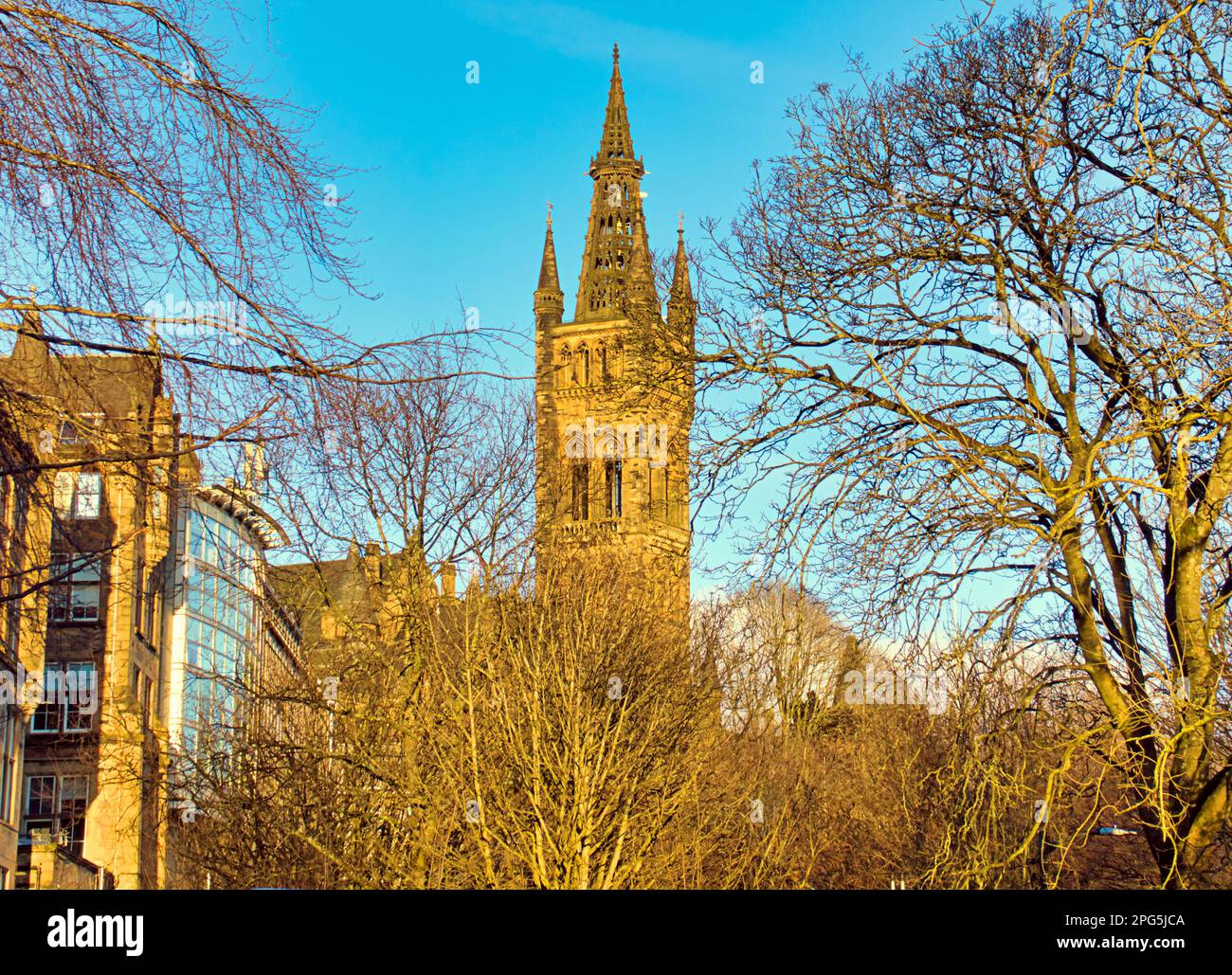 Sunny Glasgow university main building and its gothic clock tower in the sunshine Stock Photo