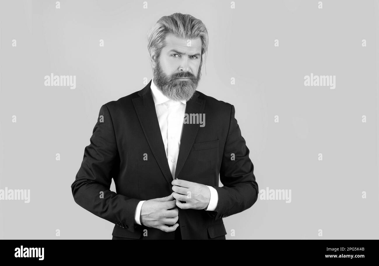 Man in black suit. Luxury business fashion. Classic suits vogue. Male