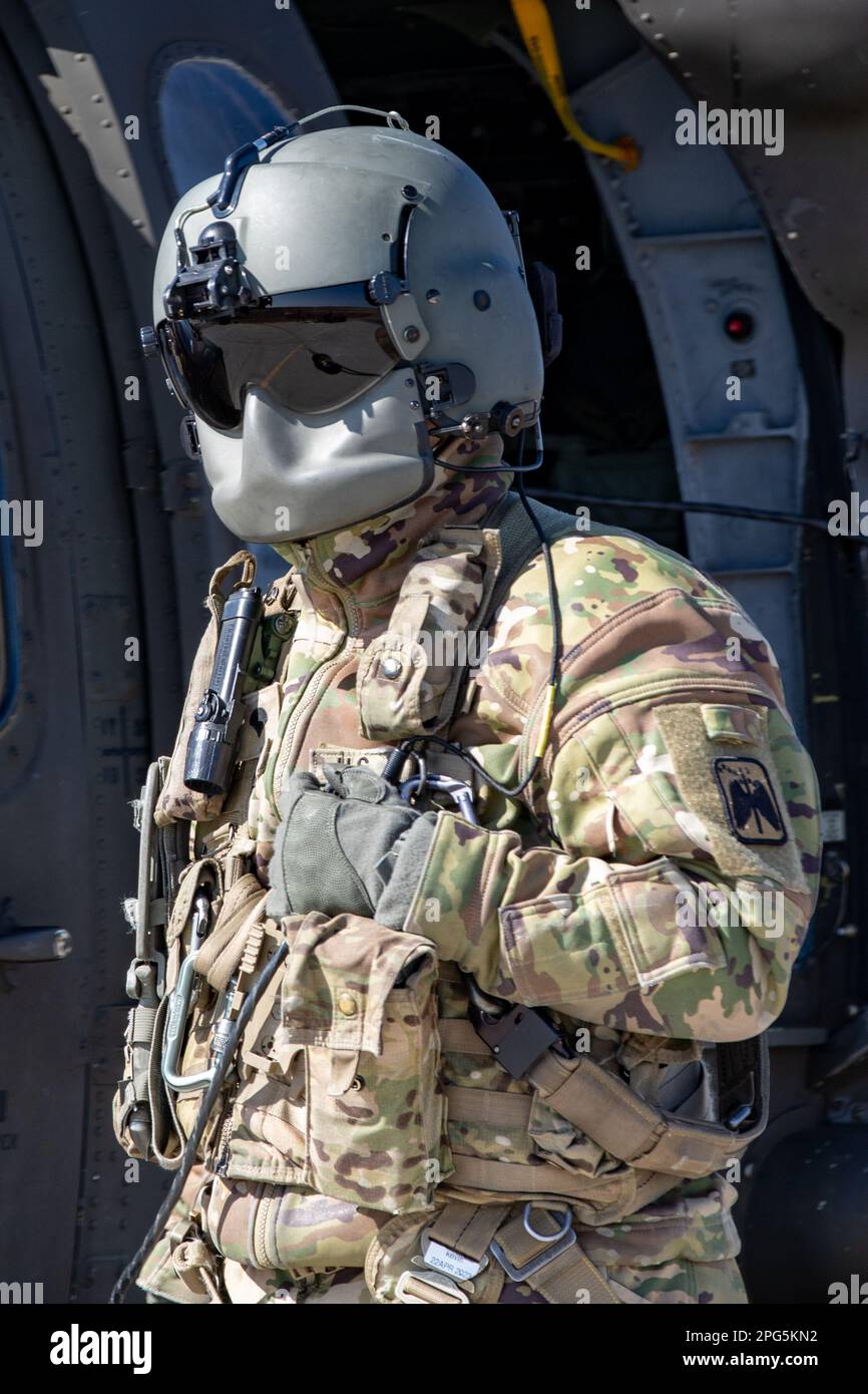 A UH60M Black Hawk helicopter crew chief assigned to Alpha Company, 2