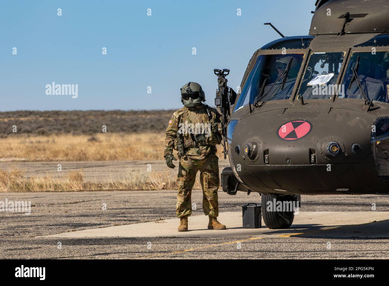 A UH60M Black Hawk helicopter crew chief assigned to Alpha Company, 2