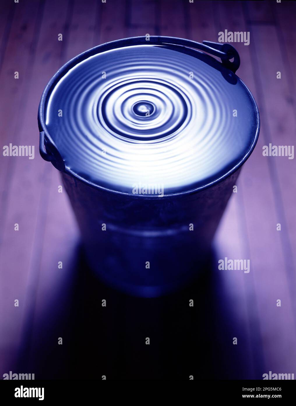 water dropping in a bucket Stock Photo Alamy