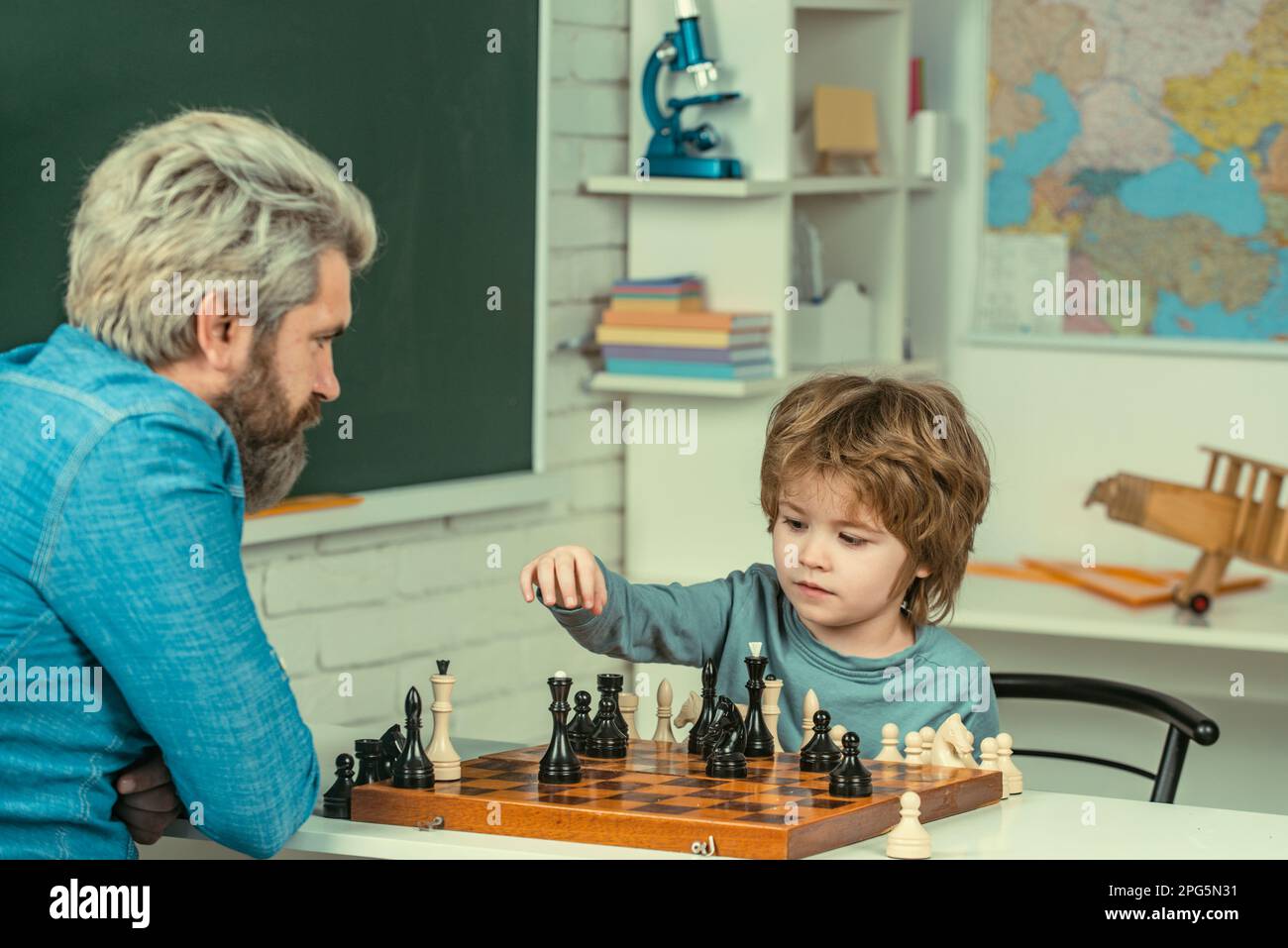 Games good for brain intelligence concept. Concentrated boy developing